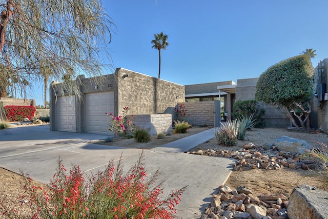 view of front of home with a garage