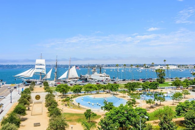 birds eye view of property featuring a water view