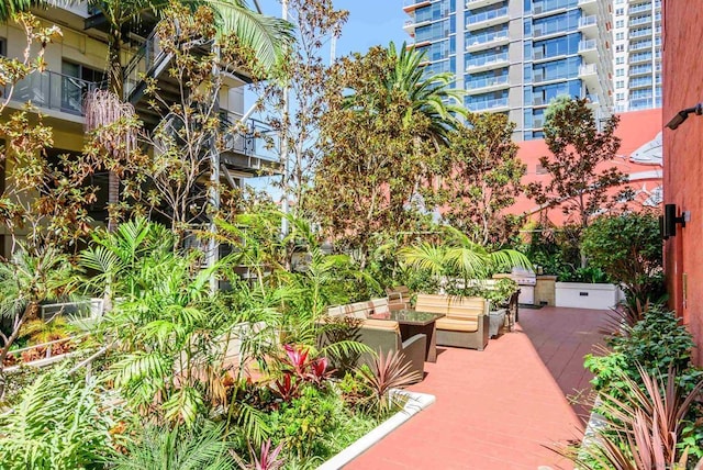 view of home's community featuring a patio area