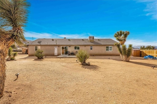 back of property featuring a patio area