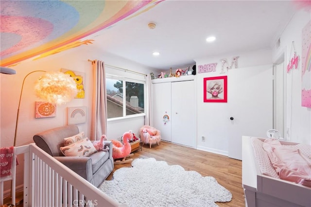 game room featuring hardwood / wood-style flooring