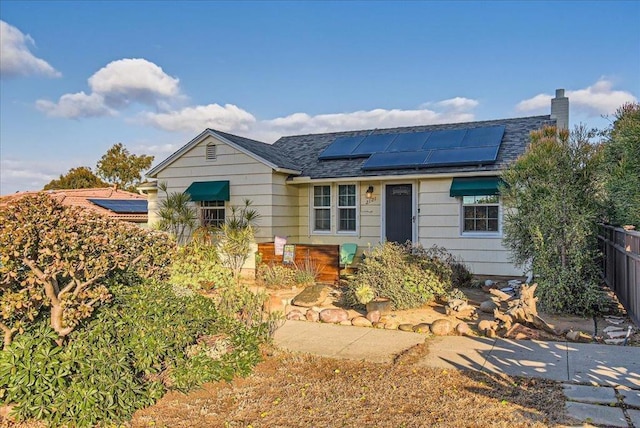 view of front of home with solar panels