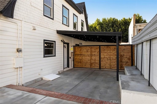 view of patio featuring a carport