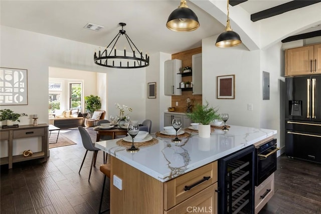 kitchen with wine cooler, pendant lighting, dark wood-type flooring, and black appliances