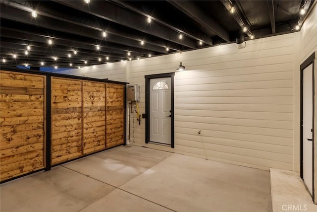 exterior space featuring wood walls