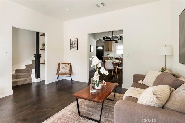 living room featuring dark hardwood / wood-style floors