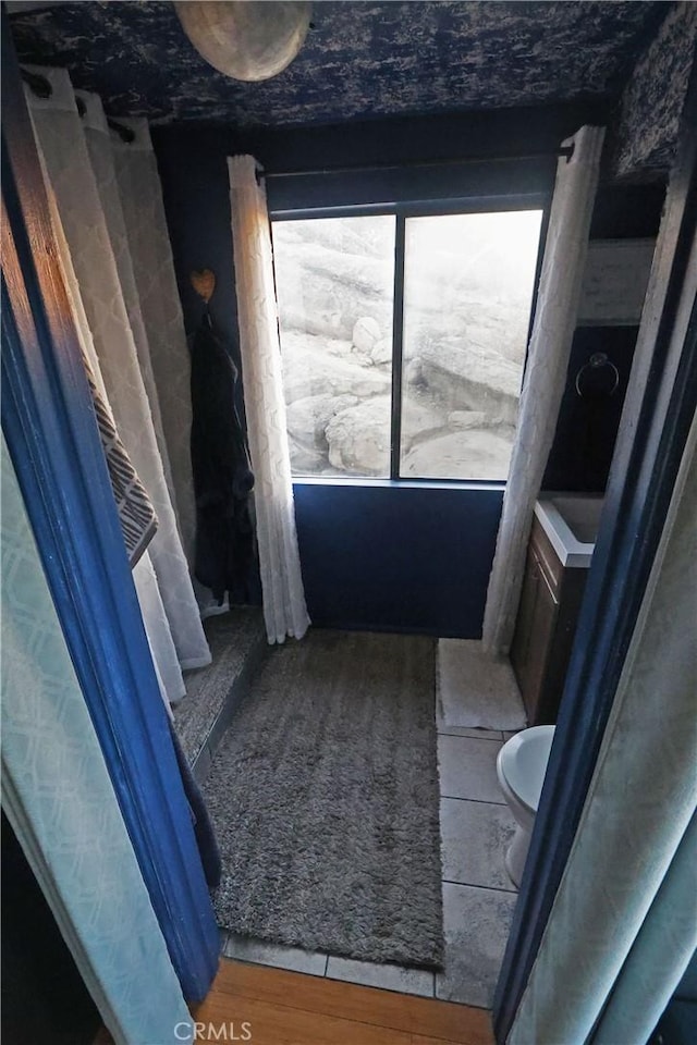 bathroom featuring wood finished floors