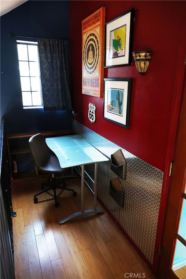 office space with hardwood / wood-style flooring and vaulted ceiling