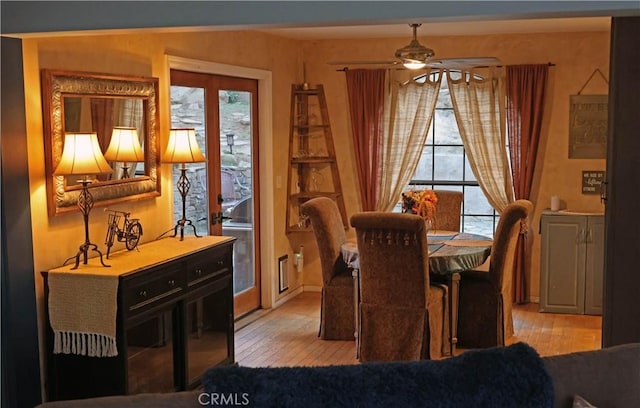 dining room featuring light wood-style floors and ceiling fan