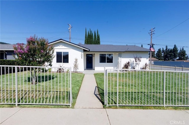 view of front of home with a front yard