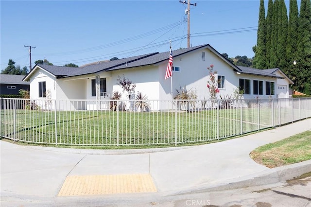 view of front of home with a front lawn