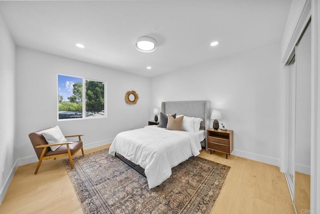 bedroom featuring light hardwood / wood-style flooring