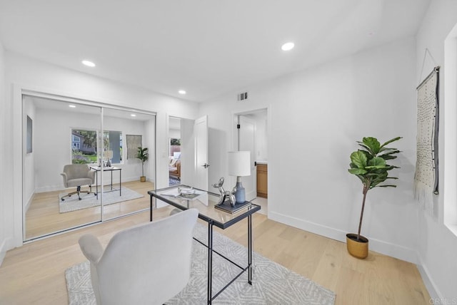 home office featuring light hardwood / wood-style floors