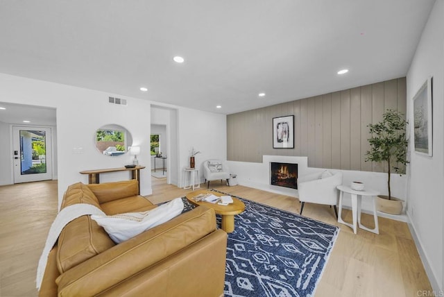 living room with light hardwood / wood-style flooring