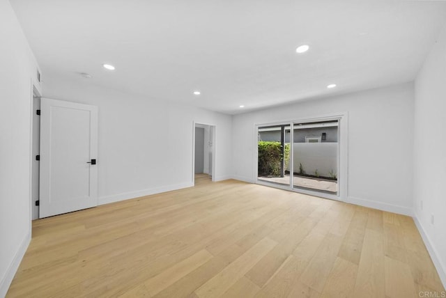 empty room with light wood-type flooring