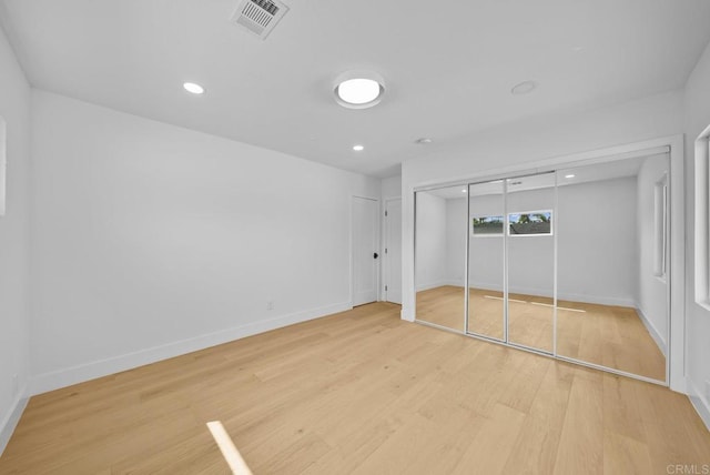 unfurnished bedroom featuring light hardwood / wood-style flooring