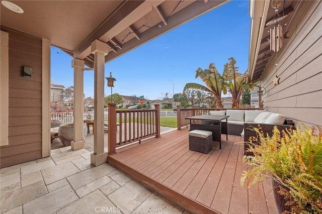 deck with outdoor lounge area