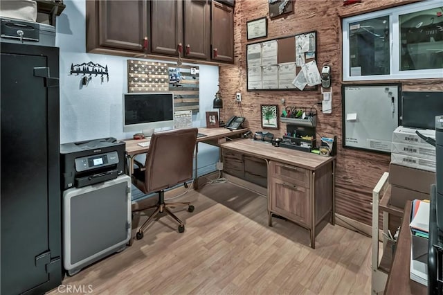 office with light hardwood / wood-style floors