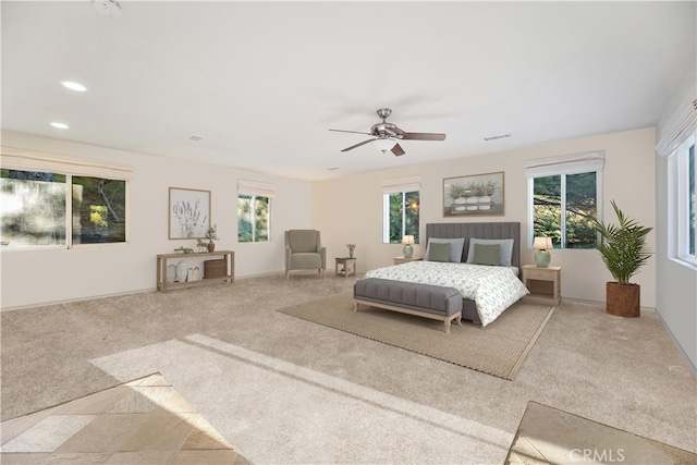 bedroom with ceiling fan and carpet