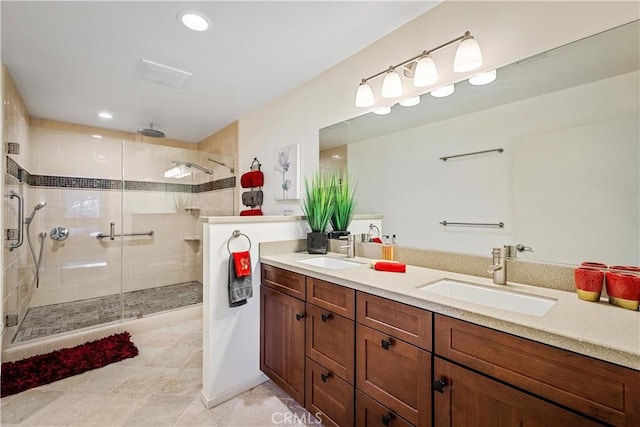 bathroom with vanity and walk in shower