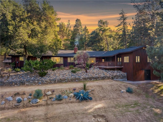 view of front of house featuring a deck