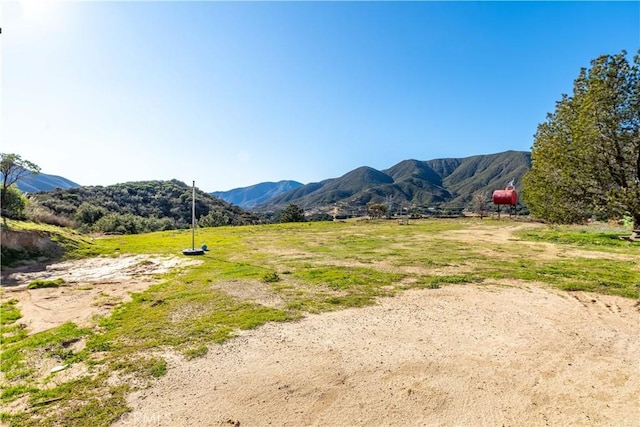 property view of mountains featuring a rural view