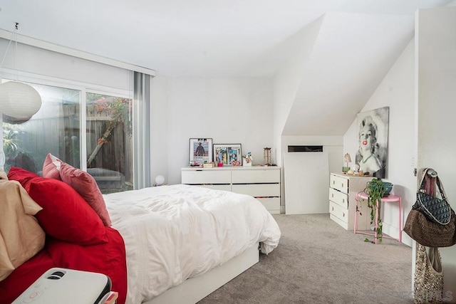 carpeted bedroom featuring access to outside