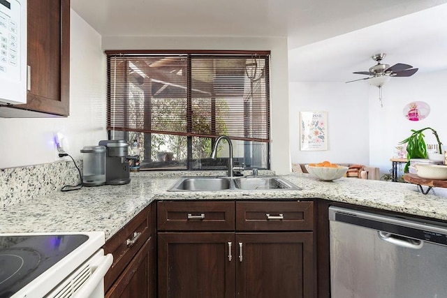 kitchen featuring dishwasher, dark brown cabinets, sink, and ceiling fan