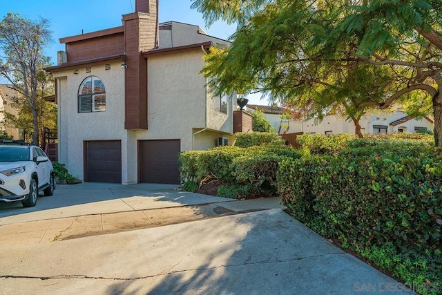 exterior space with a garage