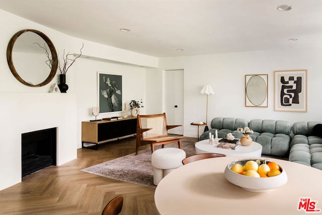 living room featuring parquet floors