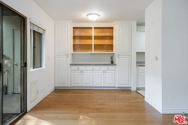 interior space with light hardwood / wood-style floors