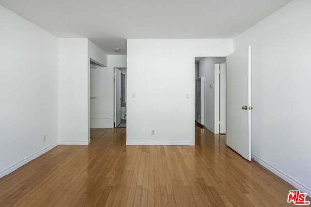 unfurnished bedroom with light hardwood / wood-style floors