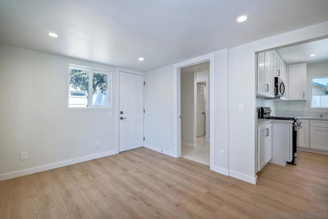 entrance foyer featuring light hardwood / wood-style floors