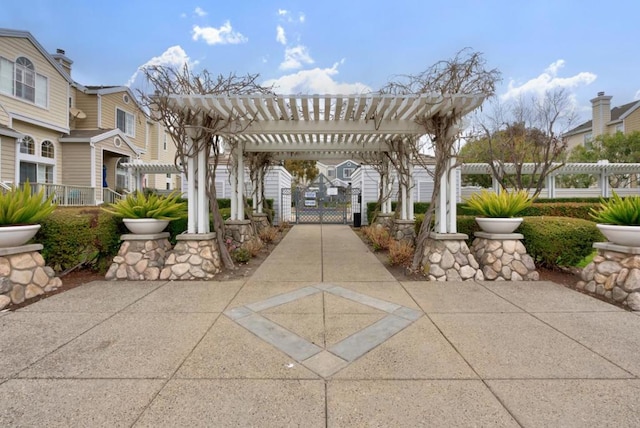 view of home's community featuring a pergola