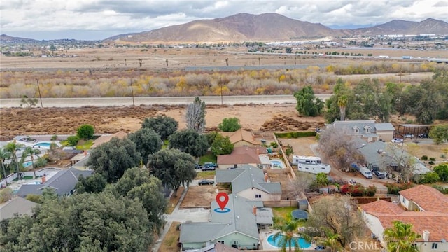 bird's eye view with a mountain view