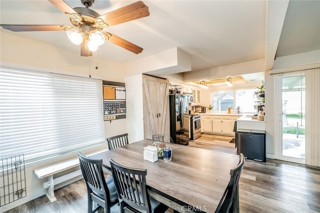 dining room with light wood-type flooring