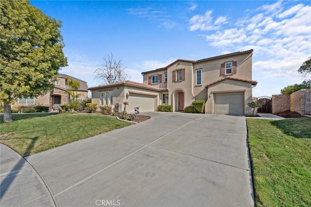 mediterranean / spanish house with a front yard