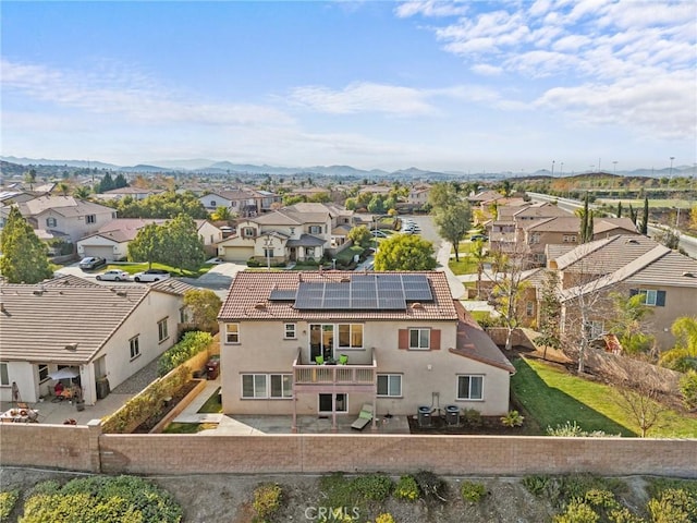 drone / aerial view featuring a mountain view