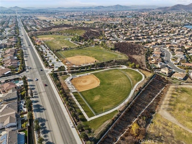 drone / aerial view featuring a mountain view