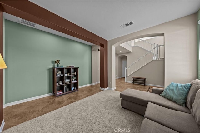 living room featuring tile patterned floors