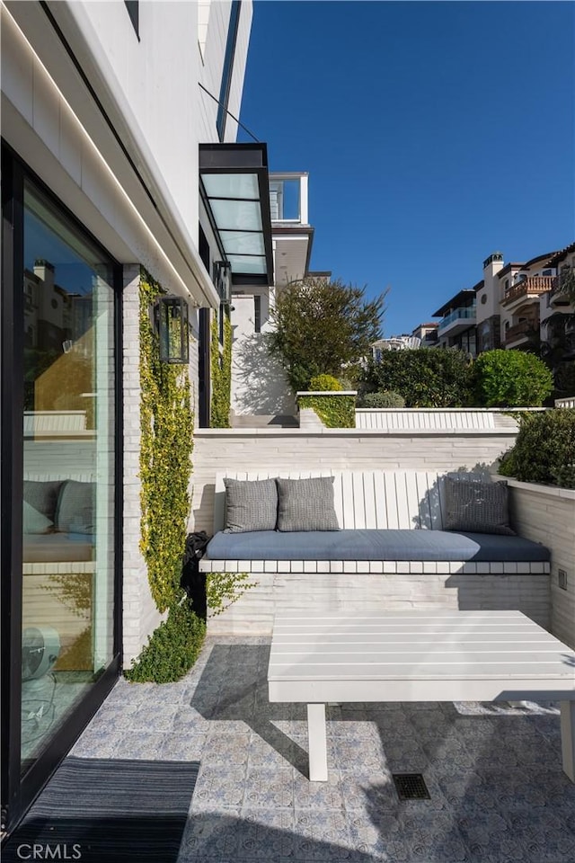 view of patio / terrace with a balcony