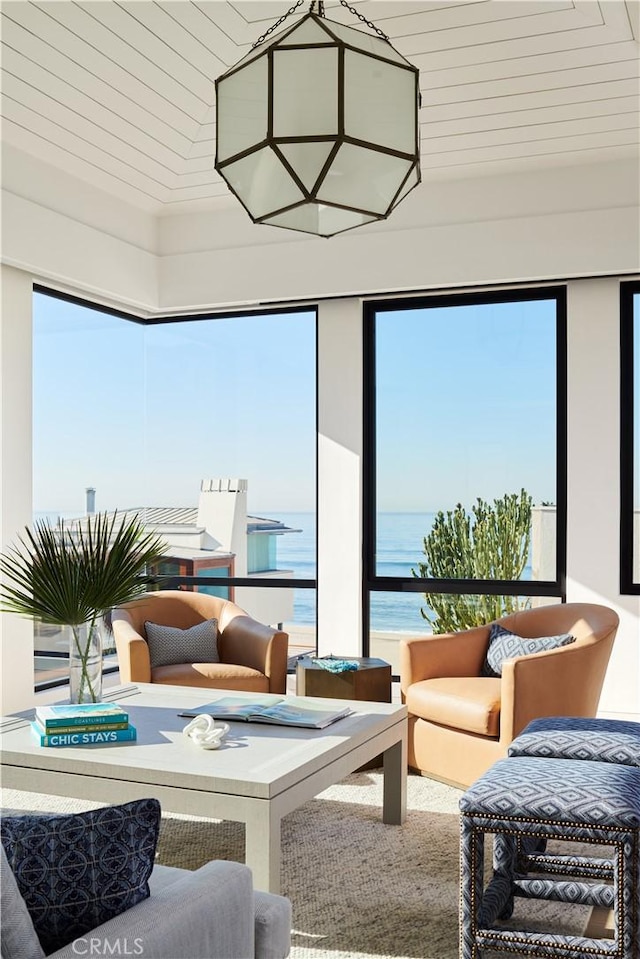 sunroom with a water view