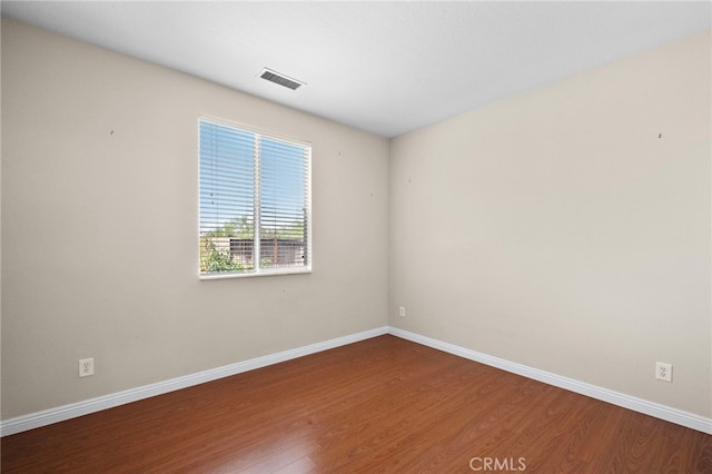 8015 Ralston Pl, Riverside, CA 92508 - spare room with wood finished floors and baseboards