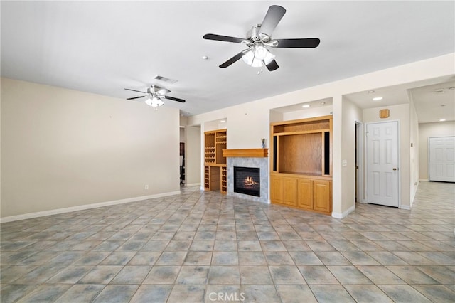 8015 Ralston Pl, Riverside, CA 92508 - unfurnished living room with a ceiling fan, recessed lighting, baseboards, a tiled fireplace, and light tile patterned floors