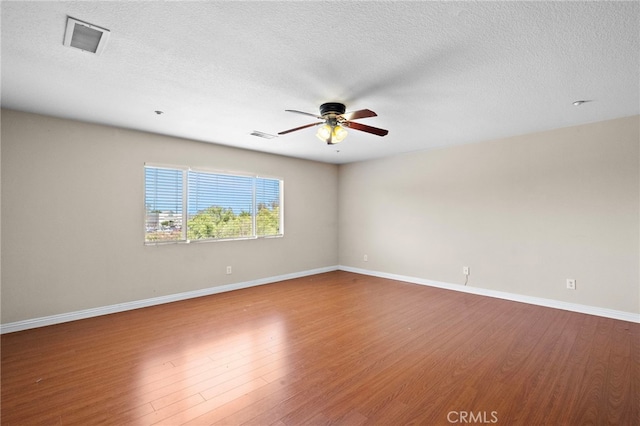 8015 Ralston Pl, Riverside, CA 92508 - unfurnished room featuring a ceiling fan, wood finished floors, baseboards, and a textured ceiling