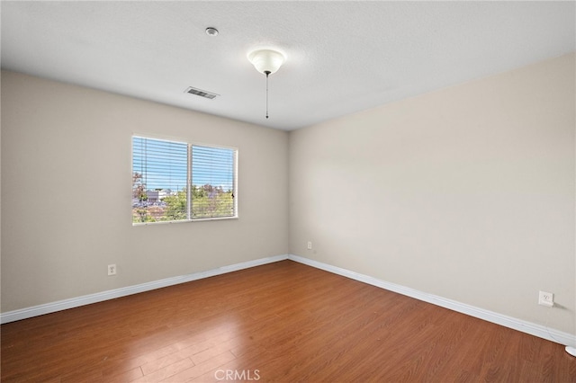 8015 Ralston Pl, Riverside, CA 92508 - spare room with wood finished floors and baseboards