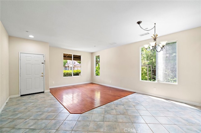 8015 Ralston Pl, Riverside, CA 92508 - entryway featuring a chandelier, light tile patterned floors, baseboards, and recessed lighting