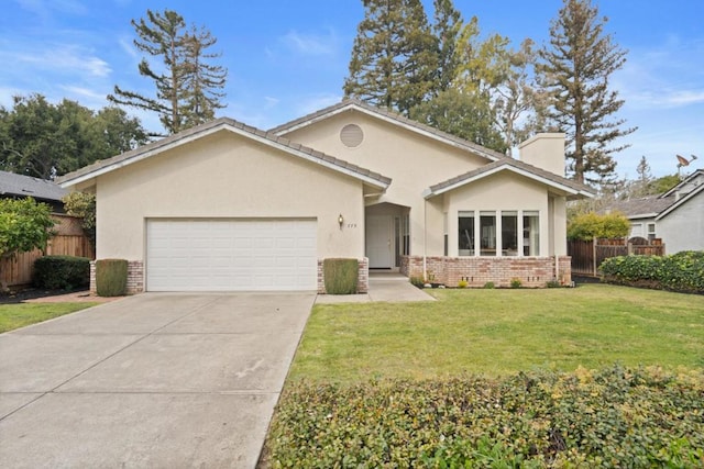 view of front facade featuring a garage and a front yard