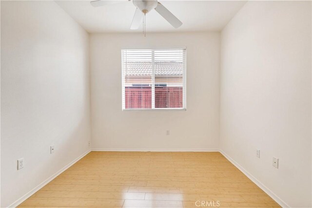 unfurnished room featuring ceiling fan and light hardwood / wood-style floors