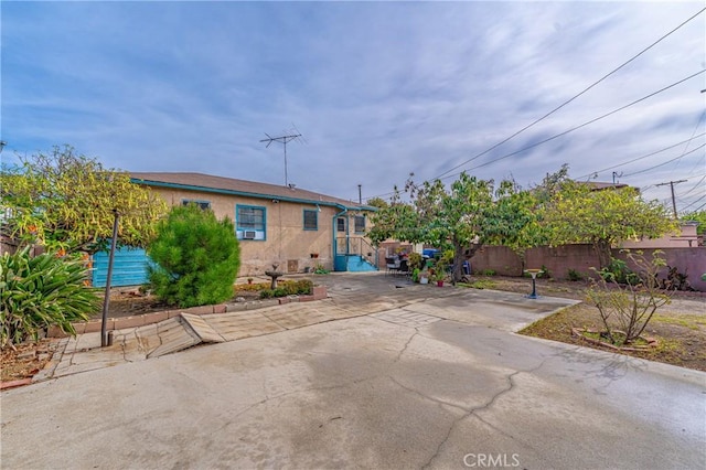 view of front of property featuring a patio